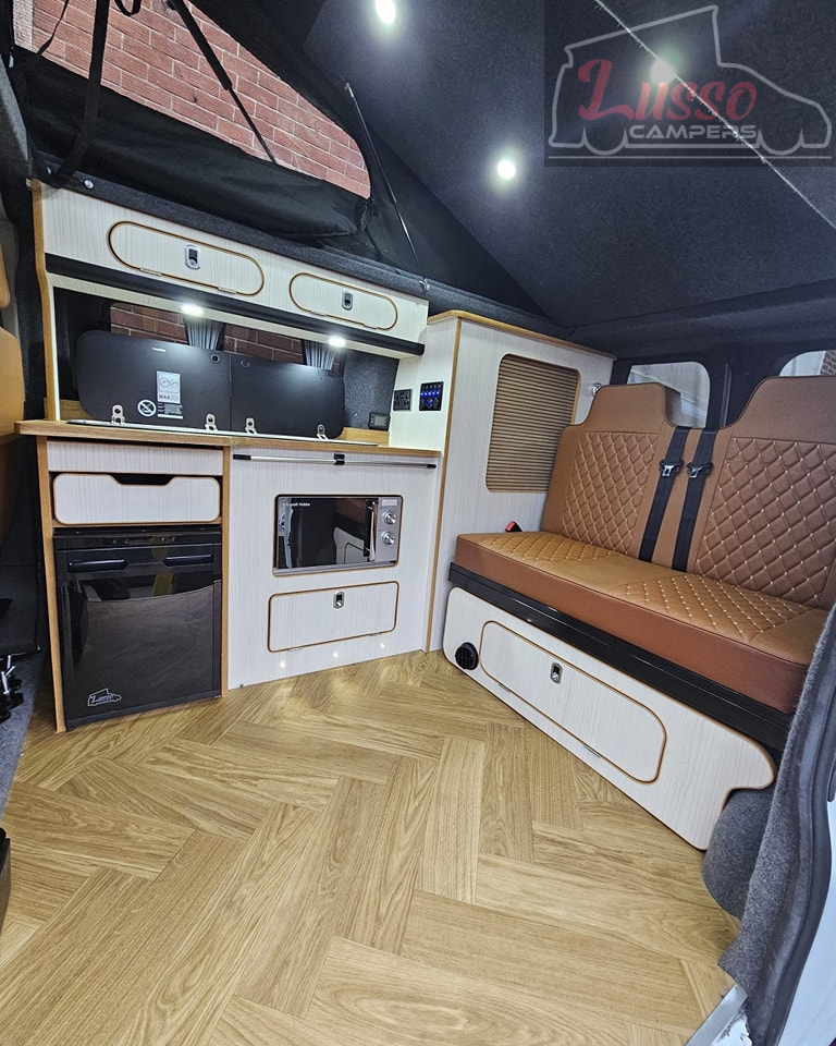 Custom-built campervan kitchen cabinets and storage